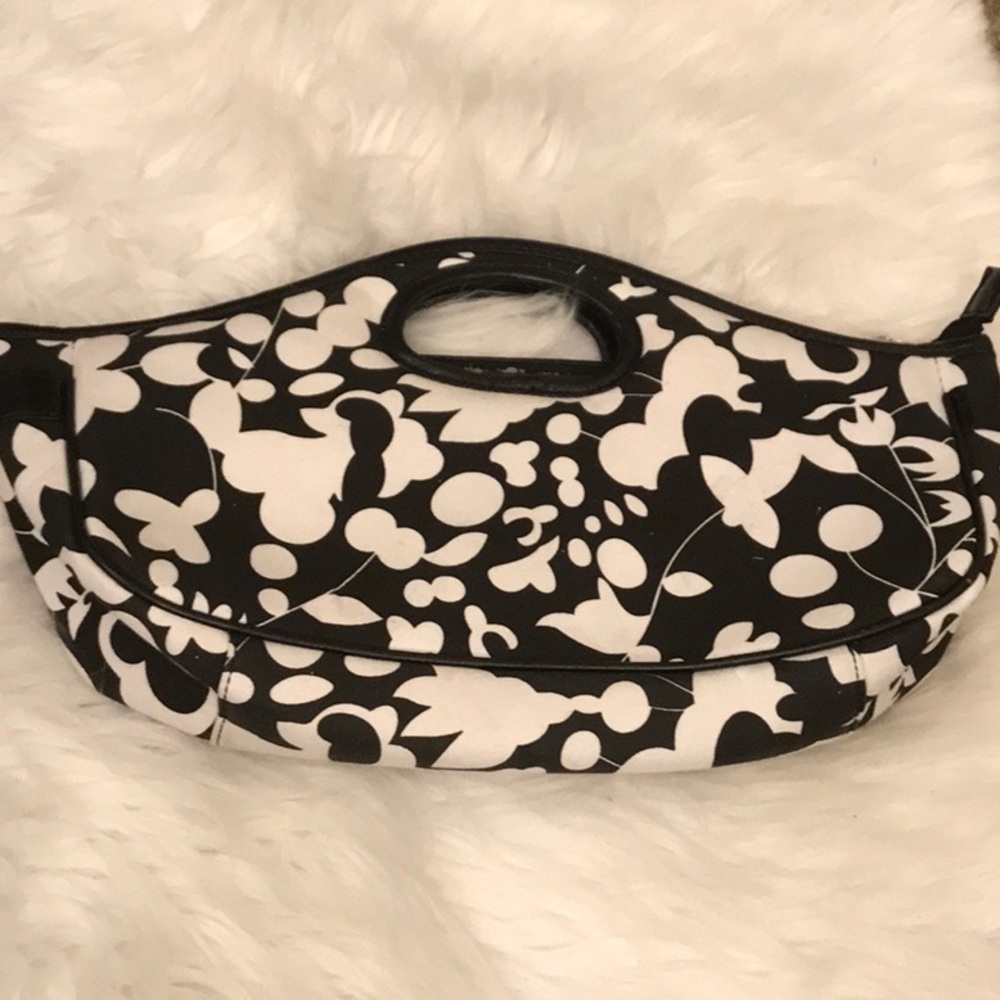 Black and white purse with floral print